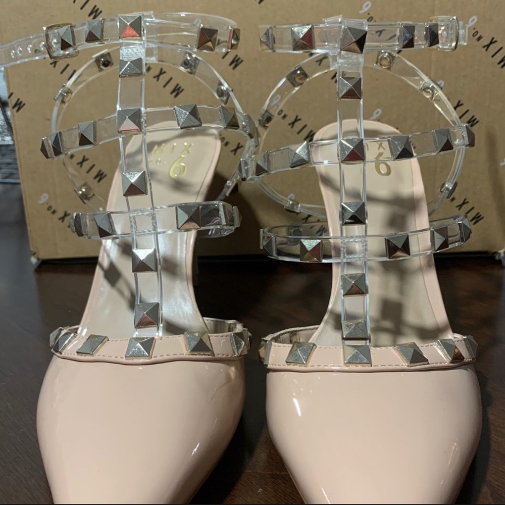 Maple sugar pointy toe heel, w/Clear studded straps.